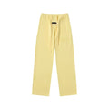 Fear Of God Essentials Tone‑on‑Tone Text Logo Straight‑Leg Sweatpants Pastel Yellow