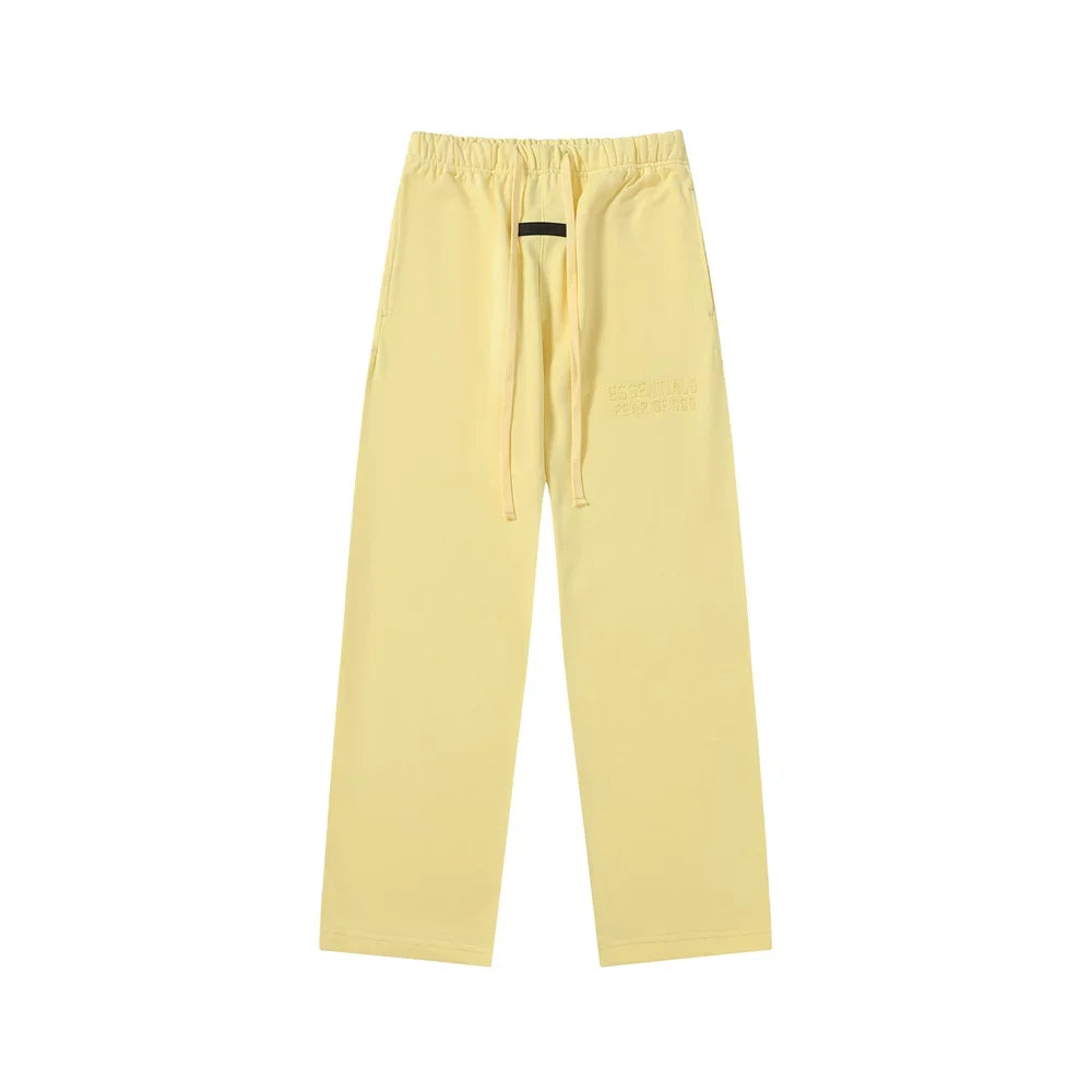 Fear Of God Essentials Tone‑on‑Tone Text Logo Straight‑Leg Sweatpants Pastel Yellow